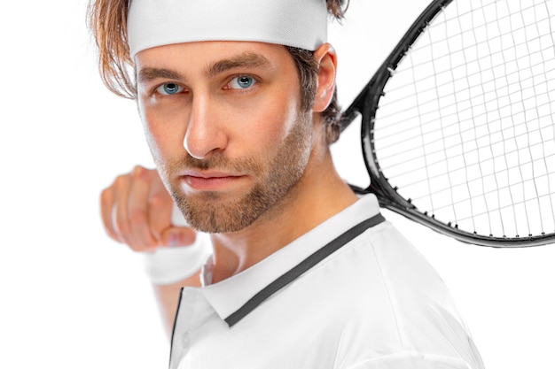 사진 tennis player with racket in white costume man athlete playing isolated on light background