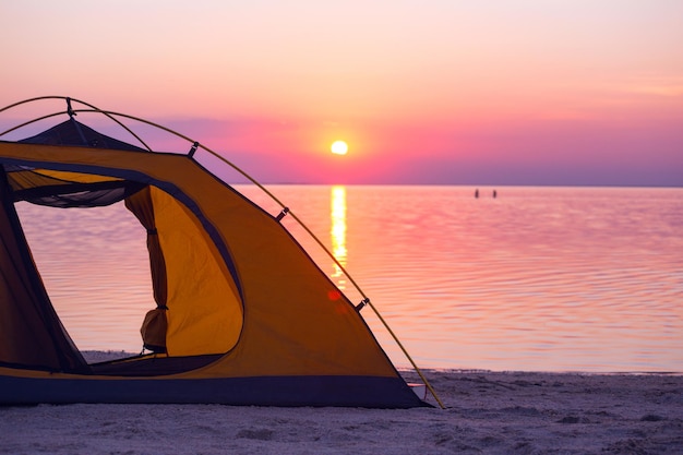 Tent on a sunset background