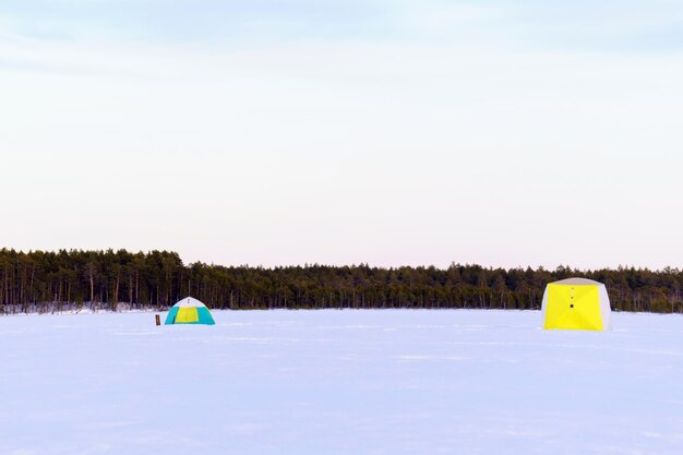 WINTER camping on ICE in a fishing tent