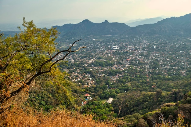 The Tepozteco archaeological zone located in the state of Morelos (Mexico). Beautiful mountainous view. To the horizon the town located in the valley of Tepoztlán