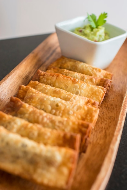 Tequenos Deep fried dough filled with meat and sauce