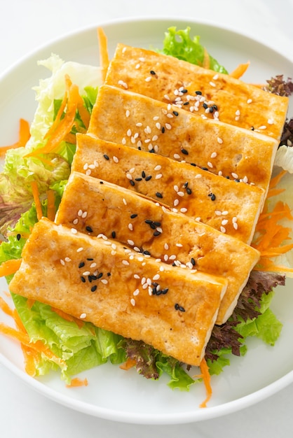 teriyaki tofu salad with sesame - vegan and vegetarian food style