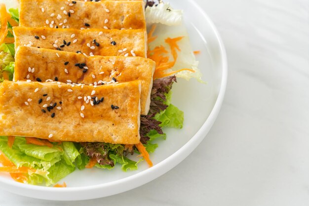 teriyaki tofu salad with sesame - vegan and vegetarian food style