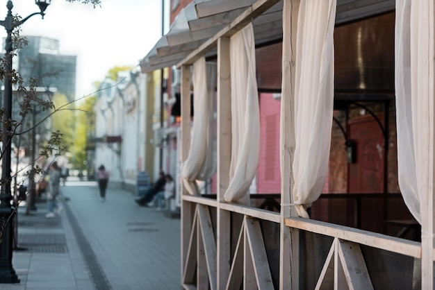 Terrace of a summer cafe in a city without people