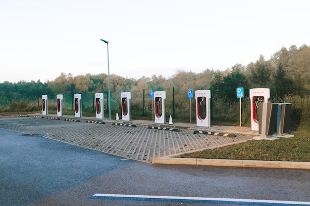Tesla Supercharger Station. Charger used to charge electric vehicle fast with zero emissions