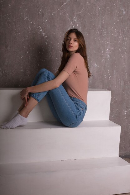 Test photo shoot for young lovely model wearing jeans 