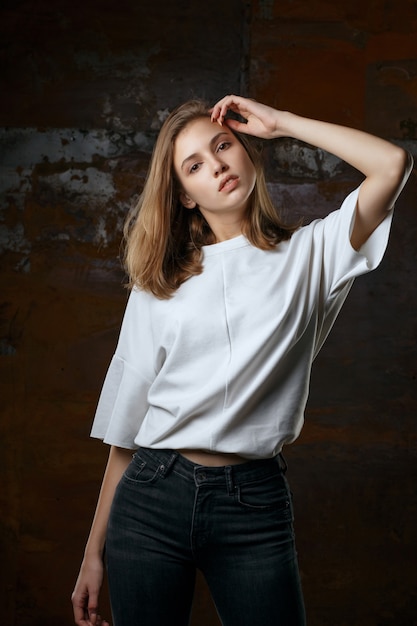Test shooting for gorgeous young model wears jeans and shirt
