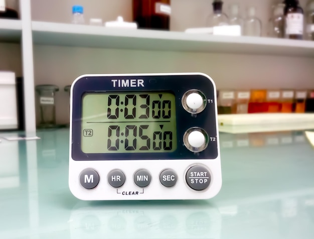 Test time counting laboratory timer isolated with blur background