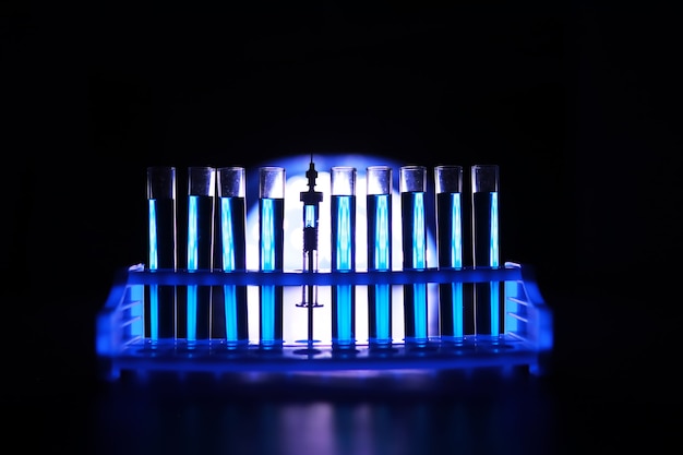 Test tube of glass overflows new liquid solution potassium blue conducts an analysis reaction takes various versions reagents using chemical pharmaceutics cancer manufacturing .