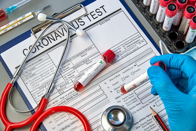 Photo a test tube with a negative blood sample for the covid-19 test