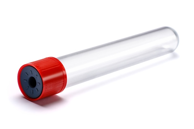 Test tube with red plug isolated on white.