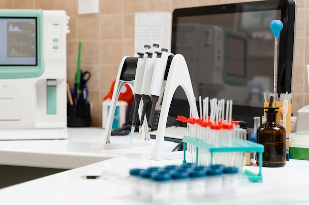 Test tubes for gynecological and cytological analysis closeup Medical equipment in lab