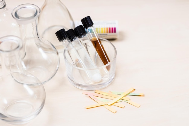 Test tubes with solutions flasks and indicators