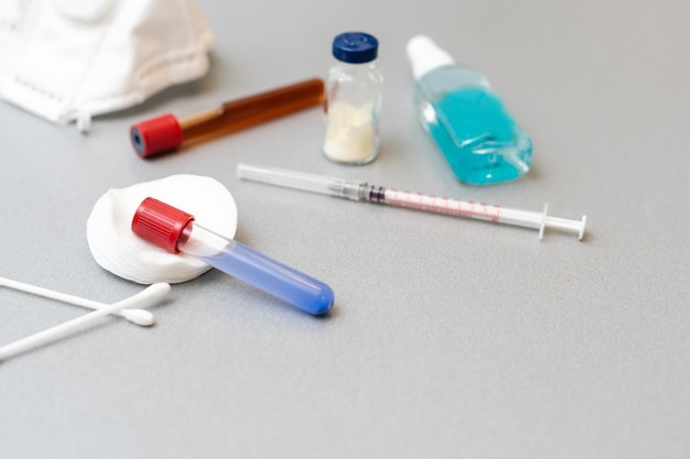 test tubes with vaccines on the table