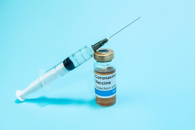 A test vaccine for coronavirus. A vial with a Vaccine from Covid-2019. A cure for the virus. Experimental medicine.