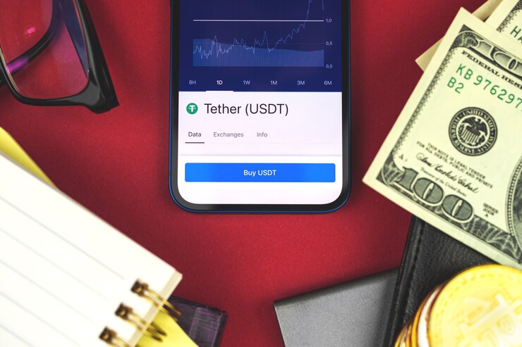Photo tether usdt crypto currency trading and exchange business background, investment and finance workspace with mobile phone banking and dollars on the table, top view photo