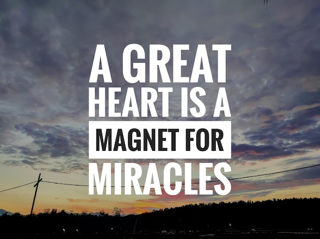 写真 テキスト a great heart is a magnet for miracles 日の出の背景動機の引用