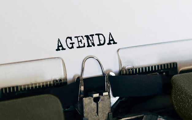 Text Agenda typed on retro typewriter