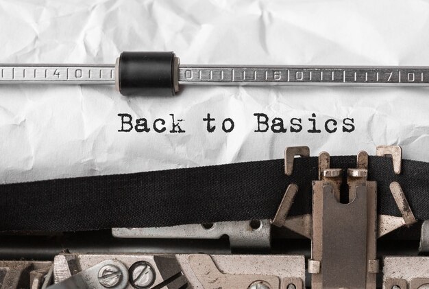 Text Back to Basics typed on retro typewriter