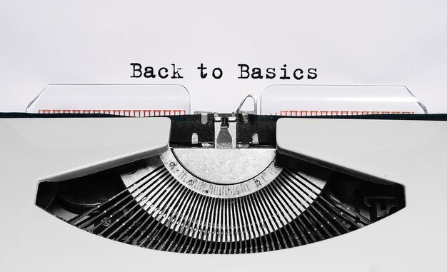 Text Back to Basics typed on retro typewriter