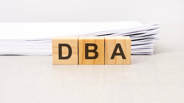 Text DBA Data Base Administrator made with wood building blocks stock image