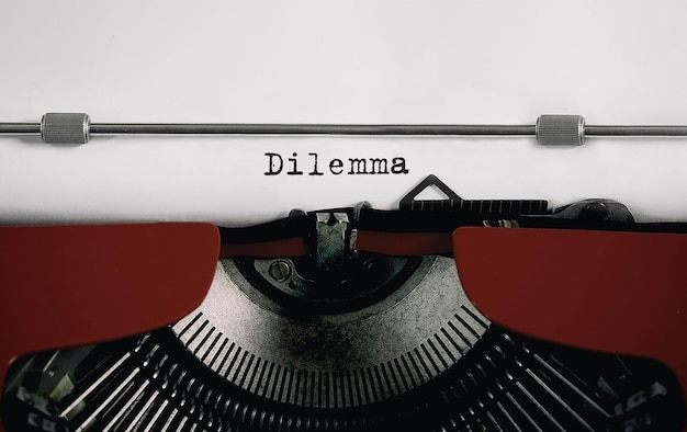 Text dilemma typed on retro typewriter