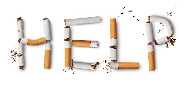 Photo text 'help' made from broken cigarettes