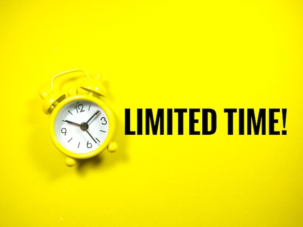 Text LIMITED TIME with alarm clock on yellow background