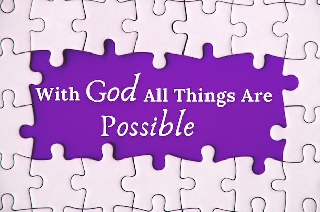 Text on missing jigsaw puzzle With God all things are possible With purple background