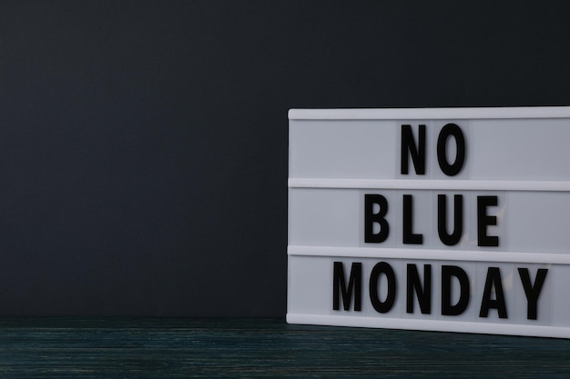 Text No blue Monday on dark blue background space for text