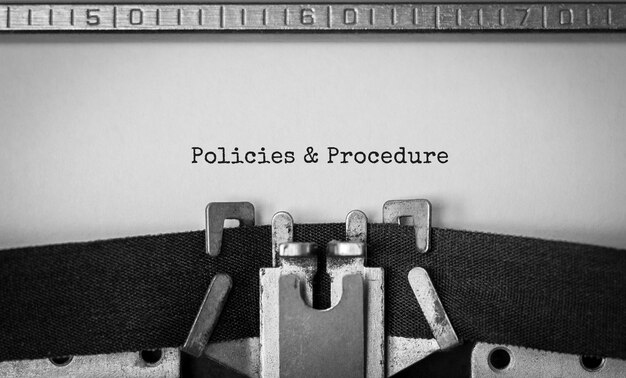 Text policies and procedure typed on retro typewriter