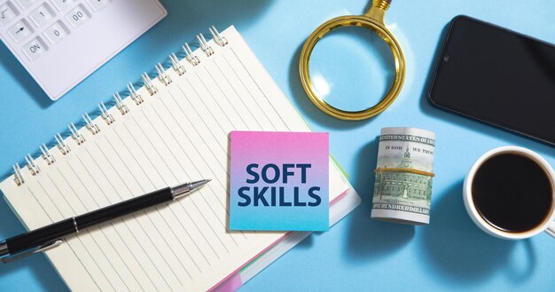 Text Soft Skills on sticky note with a business objects