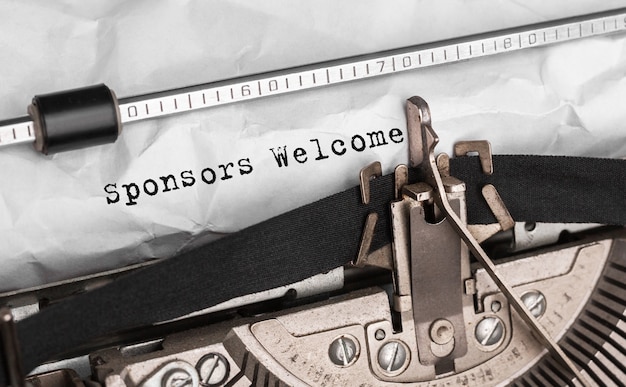 Text Sponsors Welcome typed on retro typewriter