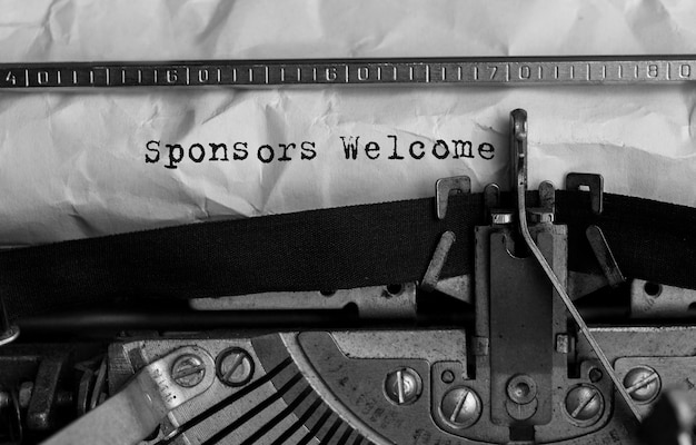 Text Sponsors Welcome typed on retro typewriter