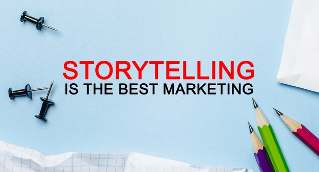 Text Storytelling is de beste marketing op een wit notitieblok met potloden