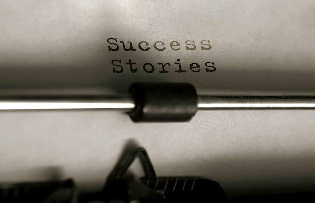 Text success stories typed on retro typewriter