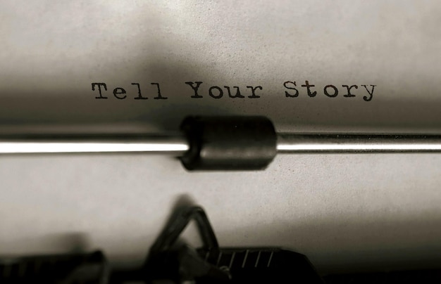 Text Tell Your Story typed on retro typewriter