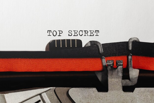 Photo text top secret typed on retro typewriter
