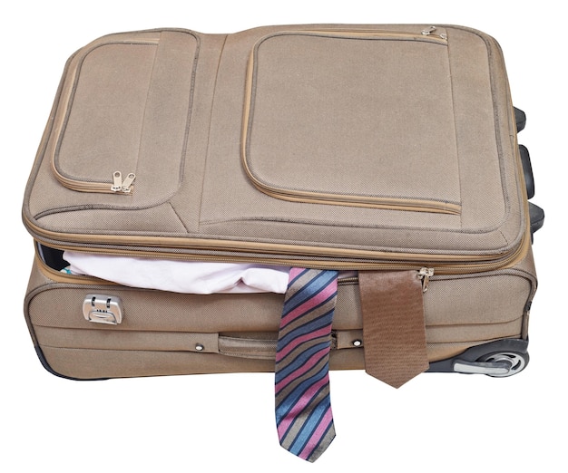 Photo textile suitcase with two fell out ties isolated