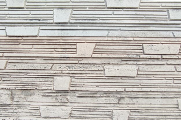 Photo textura pared de ladrillos blancos
