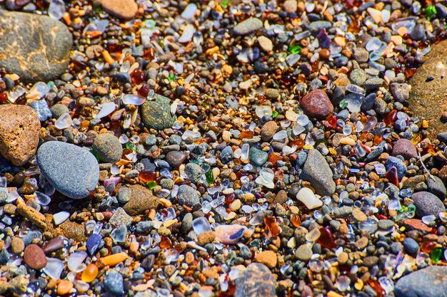 Textural asset of beach filled with colorful and smooth glass pieces