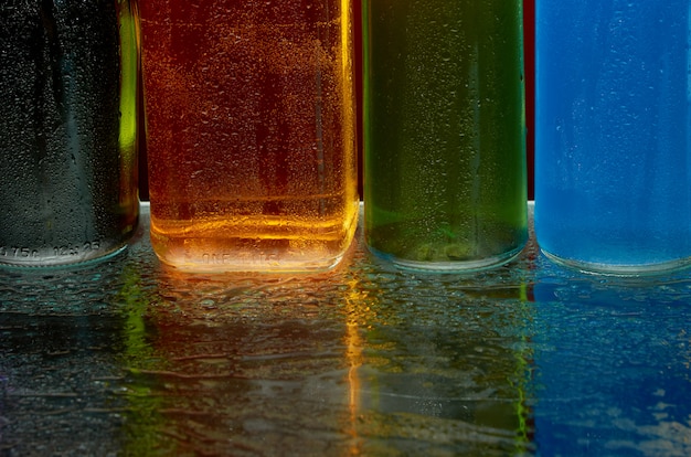 The texture of alcoholic beverages by the glass in a spray of water