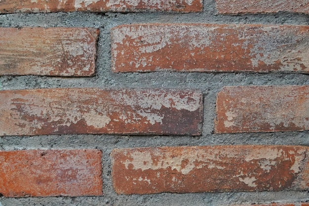 texture of the arrangement of red bricks for the walls of the house