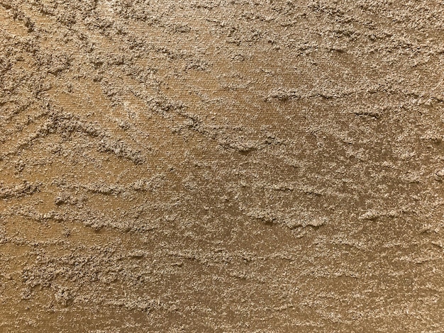 アーティスティック・プラスター・ブロンズ・カラー アブストラクト・アート・スタッコ 茶色の背景とパターン・マクロ