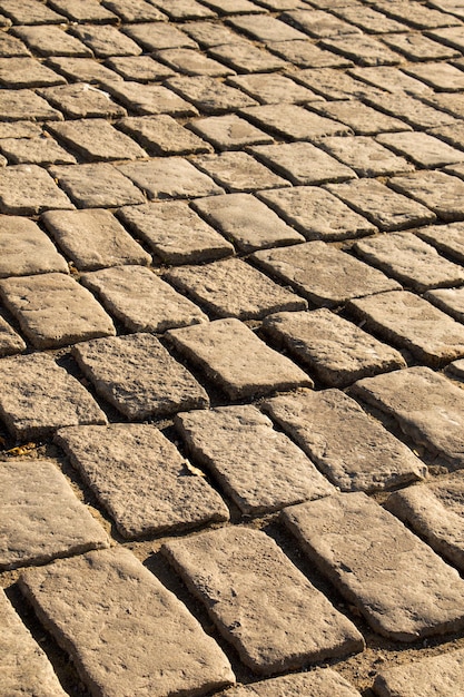 Texture background of cobblestone paved street