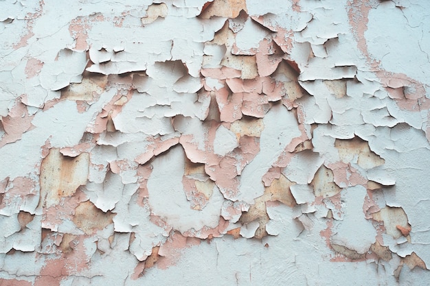 Texture background cracked peeling paint plaster.