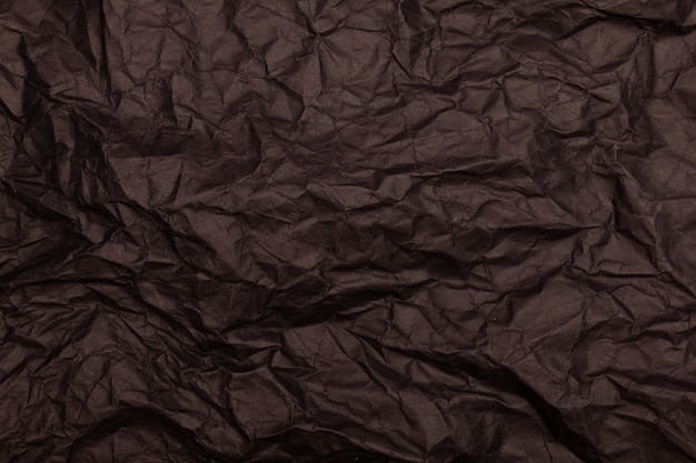 Texture or background of detailed black toned crumpled paper