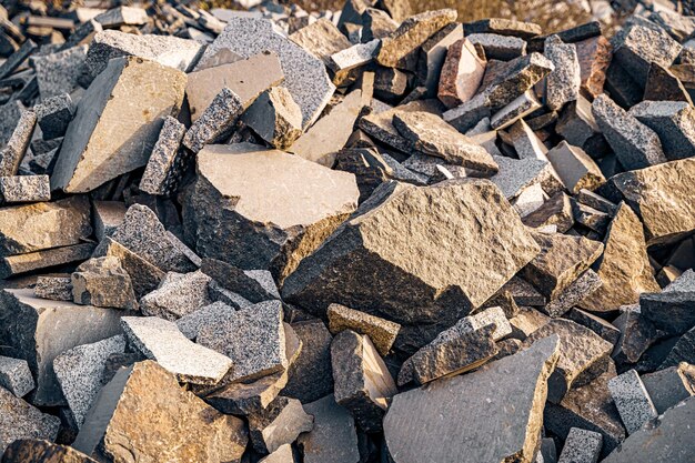 Photo texture background layers and cracks in sedimentary rock on cliff face cliff of rock mountain rock slate in the mountain