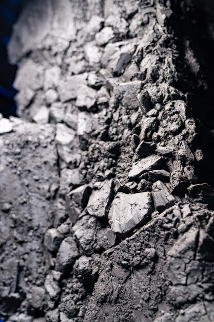 Texture background layers and cracks in sedimentary rock on cliff face Cliff of rock mountain Rock slate in the mountain