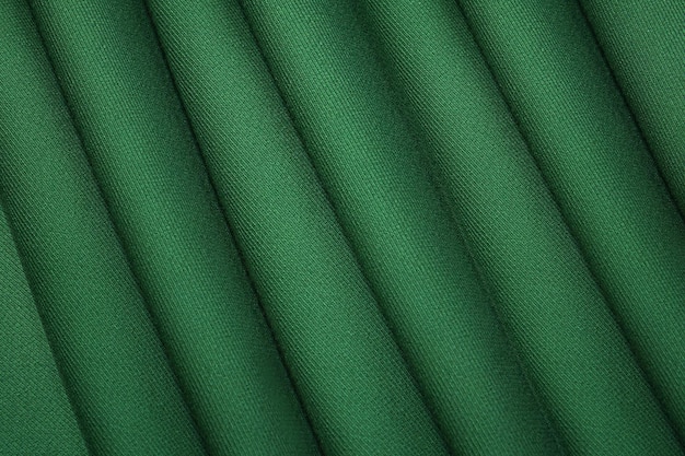 写真 テクスチャ背景パターン緑のシルク生地のテクスチャ美しいエメラルドグリーンの柔らかいシルク生地